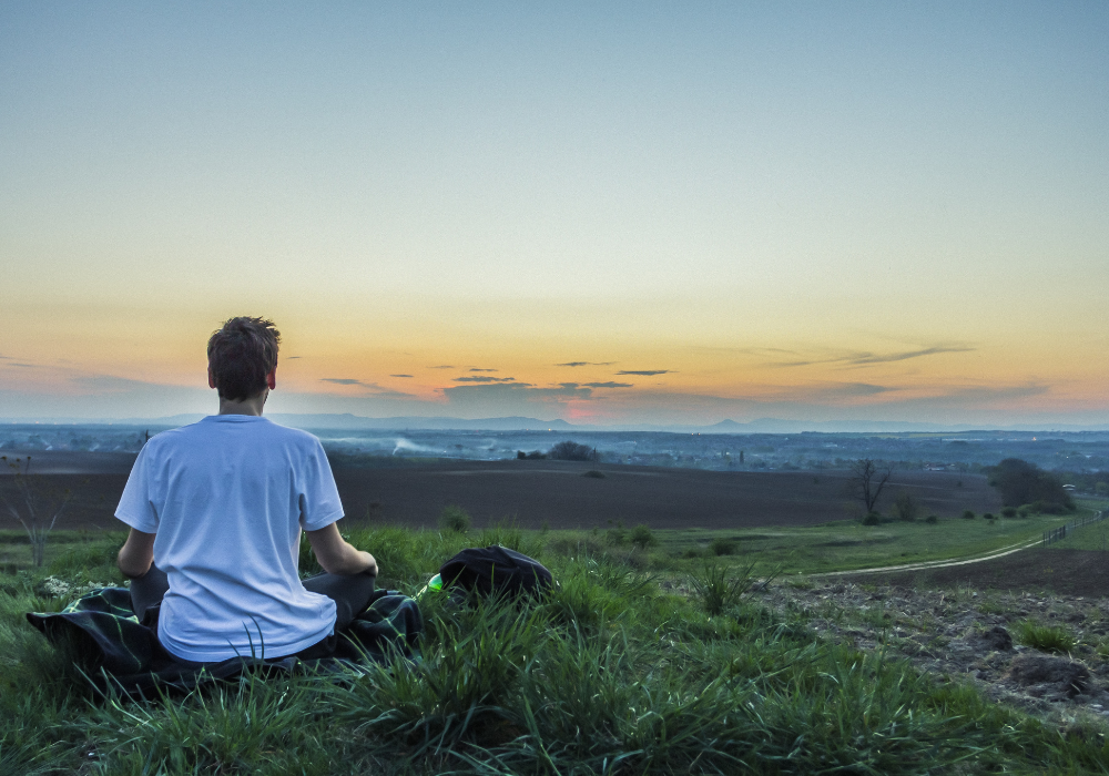 a man reclaims his power after reiki and is now meditating 